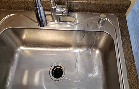 dishwasher air gap leaking